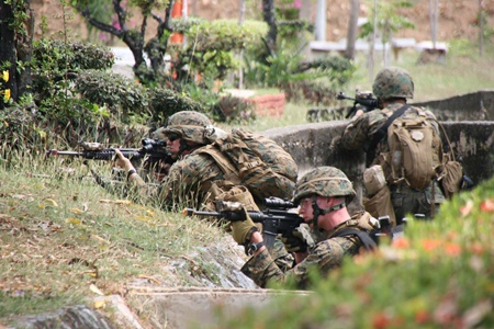 Soldiers dig in, ready for the assault at Prince Jetsada Camp in Sattahip.